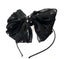 BLACK RUFFLE BOW HEADBAND.