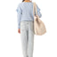 LONG SLEEVE BLUE SHIRT WITH FRILLS.
