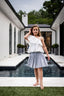 SEERSUCKER PLEATED SKIRT.