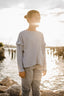 LONG SLEEVE BLUE SHIRT WITH FRILLS.