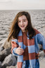 KNITTED PINK AND BLUE SWEATER.